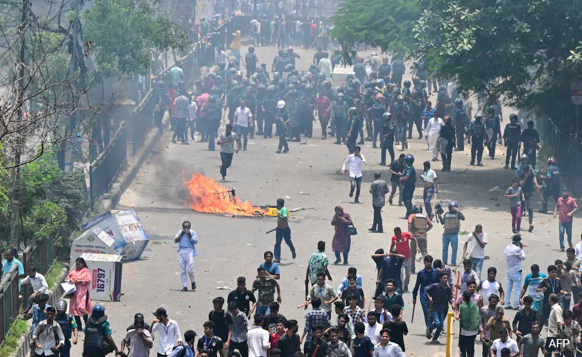 32 Dead in Bangladesh Unrest, Protesters Set Fire to TV Headquarters