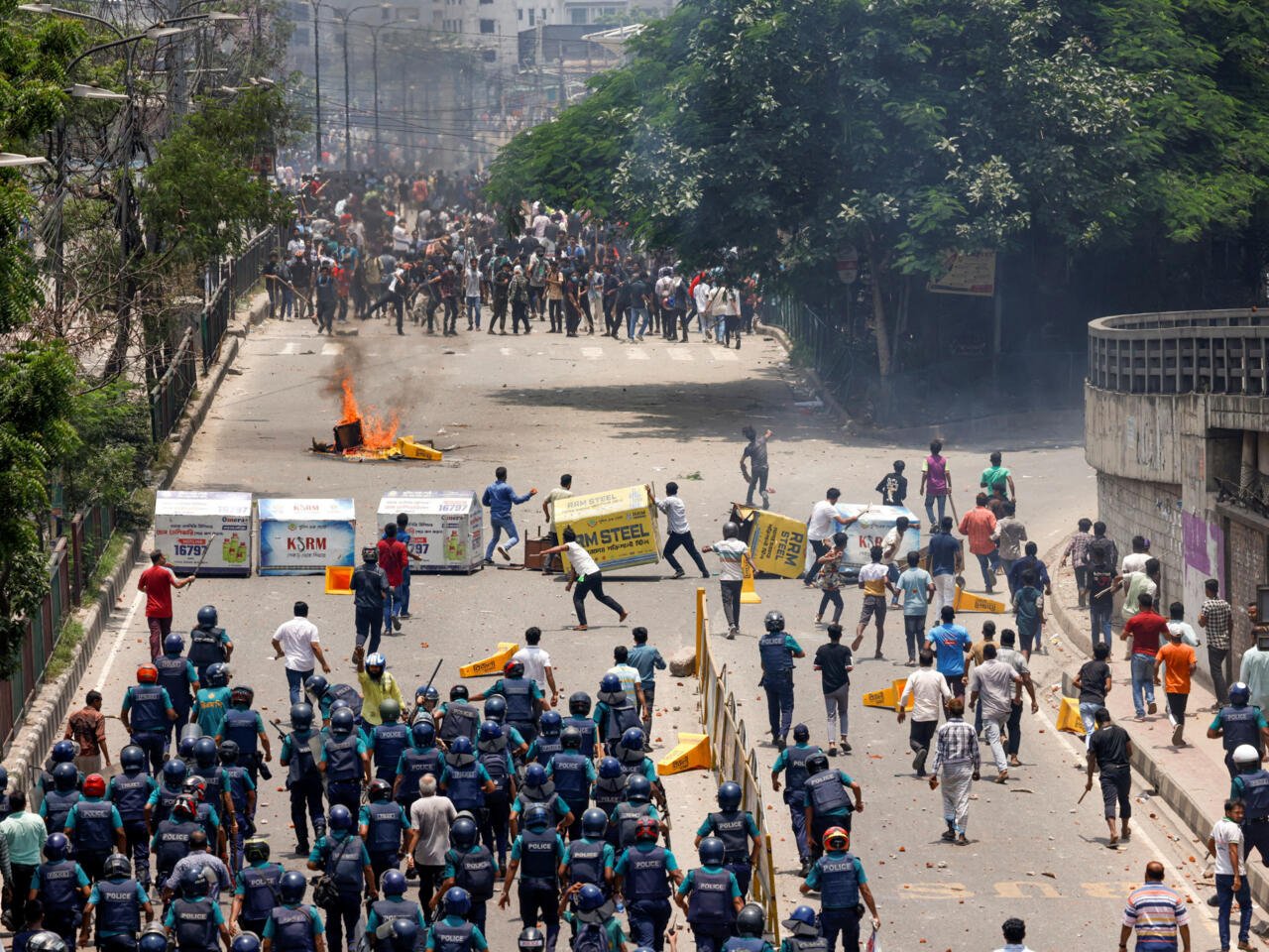 32 Dead in Bangladesh Unrest, Protesters Set Fire to TV Headquarters